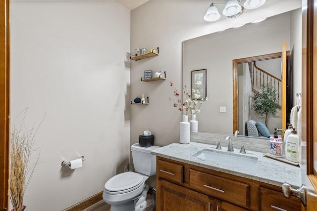 2813 S Steen Ln, Greenacres, WA 99016 - half bathroom featuring vanity and wood finished floors