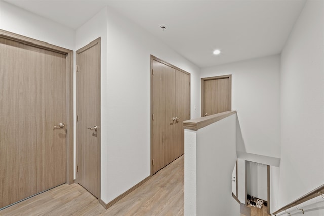 419 E E St, Deer Park, WA 99006 - hall with light wood-style flooring and an upstairs landing