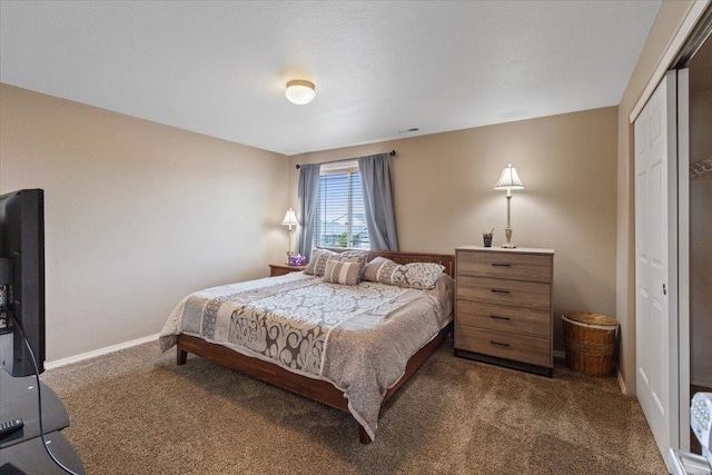 9713 W Sage Ct, Cheney, WA 99004 - bedroom with carpet flooring and a closet