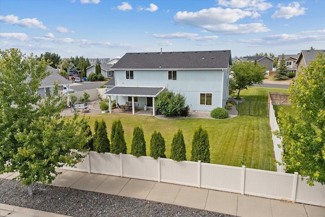 9713 W Sage Ct, Cheney, WA 99004 - back of house with a patio, a fenced backyard, a shingled roof, and a residential view