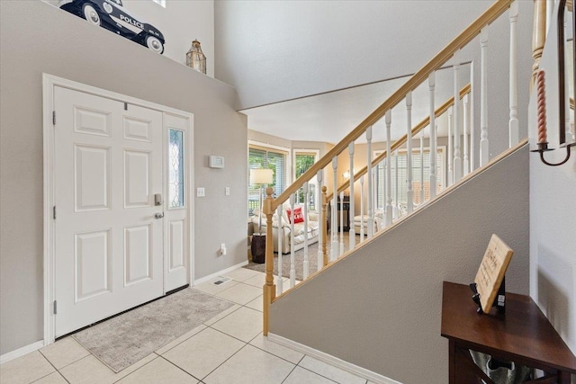 9713 W Sage Ct, Cheney, WA 99004 - foyer entrance featuring stairway and light tile patterned floors