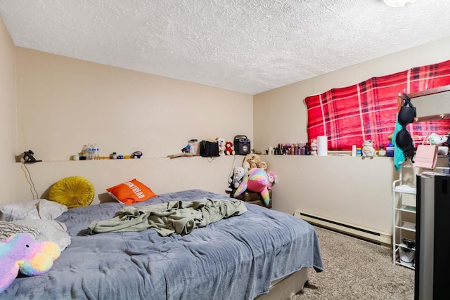 1526-1528 E Rowan Ave, Spokane, WA 99207 - bedroom with baseboard heating, carpet flooring, and a textured ceiling