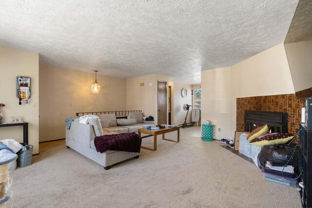 1526-1528 E Rowan Ave, Spokane, WA 99207 - living room with light carpet, a textured ceiling, and a tile fireplace