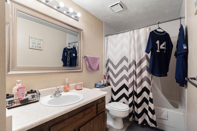 1526-1528 E Rowan Ave, Spokane, WA 99207 - bathroom featuring vanity, a textured ceiling, and shower / tub combo