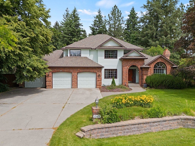 13419 N Whitehouse Ct, Spokane, WA 99208 - traditional-style home featuring brick siding, an attached garage, concrete driveway, and a front yard