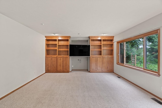 13419 N Whitehouse Ct, Spokane, WA 99208 - unfurnished living room with light carpet and baseboards