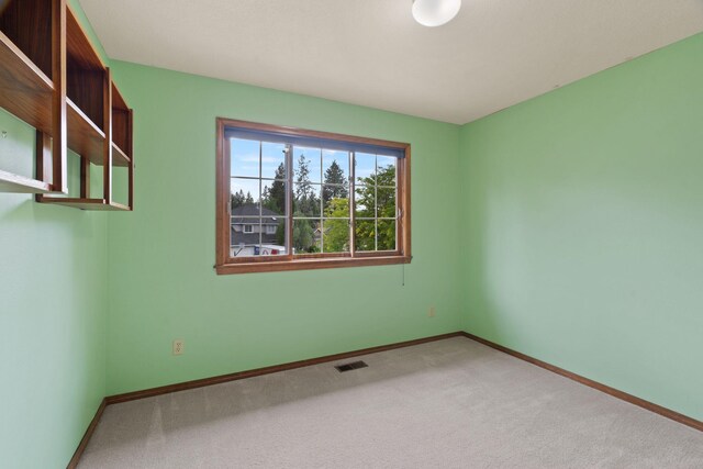 13419 N Whitehouse Ct, Spokane, WA 99208 - carpeted spare room featuring baseboards