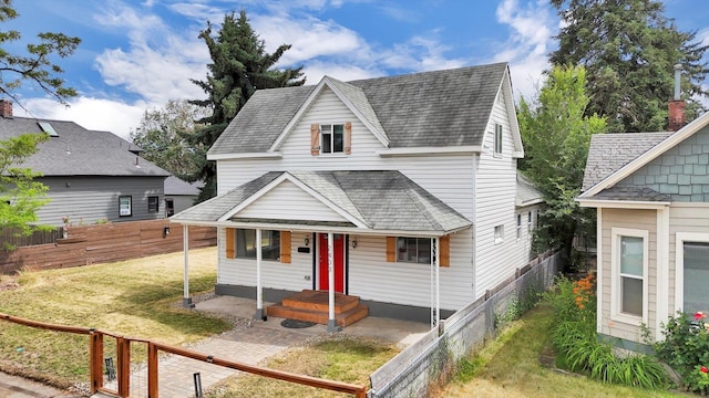 2403 W Mallon Ave, Spokane, WA 99201 - view of front facade featuring covered porch and roof with shingles