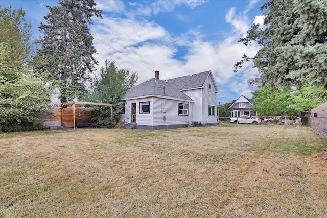 2403 W Mallon Ave, Spokane, WA 99201 - back of house featuring a chimney and a shingled roof