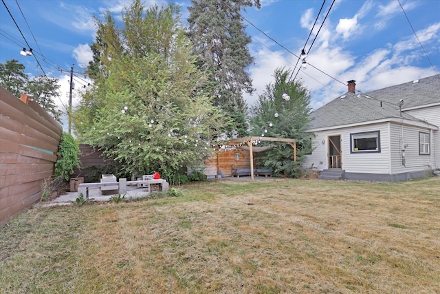 2403 W Mallon Ave, Spokane, WA 99201 - fenced backyard with a patio and entry steps