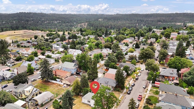 2403 W Mallon Ave, Spokane, WA 99201 - aerial view of property's location featuring a forest and nearby suburban area