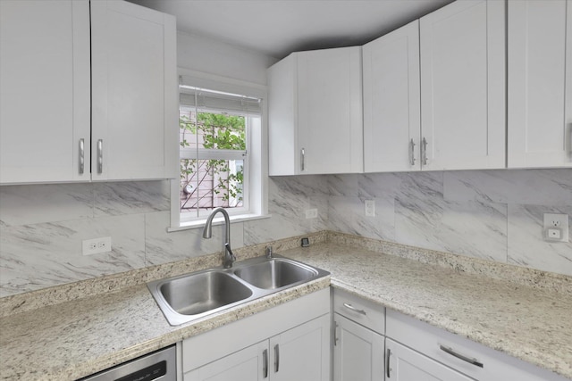 2403 W Mallon Ave, Spokane, WA 99201 - kitchen featuring white cabinetry, light countertops, and tasteful backsplash