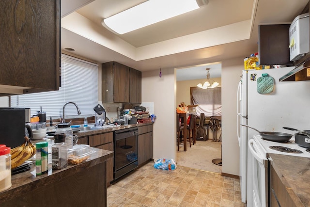 11816-11818 N Wall St, Spokane, WA 99218 - kitchen with dishwasher, white electric stove, dark countertops, a raised ceiling, and dark brown cabinets