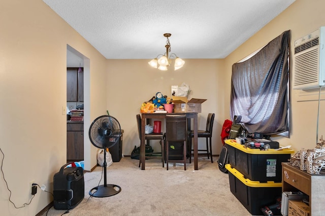 11816-11818 N Wall St, Spokane, WA 99218 - carpeted dining area with a chandelier, a textured ceiling, and a wall unit AC