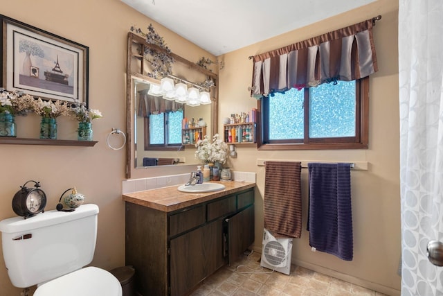 11816-11818 N Wall St, Spokane, WA 99218 - full bathroom featuring vanity and toilet