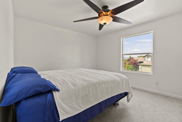 18108 E Crescent Dr, Greenacres, WA 99016 - carpeted bedroom featuring baseboards and a ceiling fan