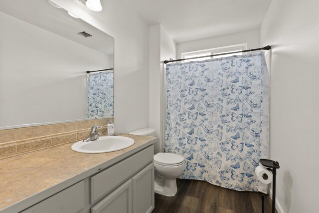 18108 E Crescent Dr, Greenacres, WA 99016 - bathroom with vanity, wood finished floors, and a shower with curtain