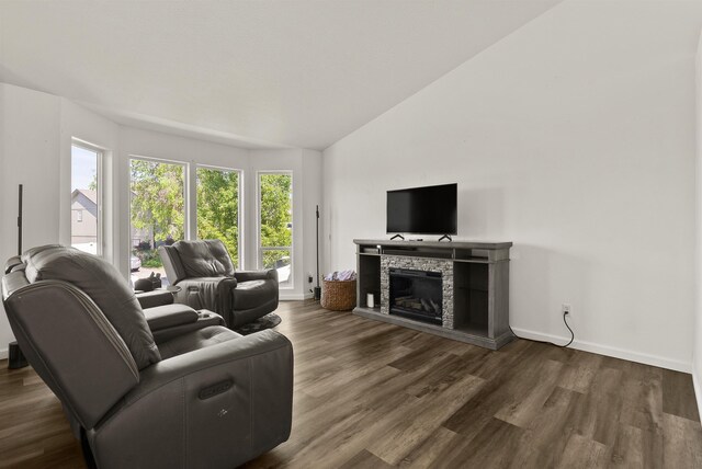 18108 E Crescent Dr, Greenacres, WA 99016 - living room featuring wood finished floors, vaulted ceiling, and a fireplace