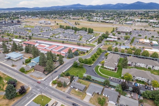 1503 E 3rd St, Post Falls, ID 83854 - aerial view of property and surrounding area featuring mountains and nearby suburban area