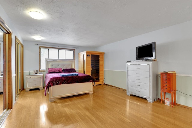 4319 S Myrtle St, Spokane, WA 99223 - bedroom with light wood-type flooring and baseboards