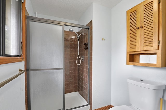 4319 S Myrtle St, Spokane, WA 99223 - bathroom featuring a shower stall and toilet
