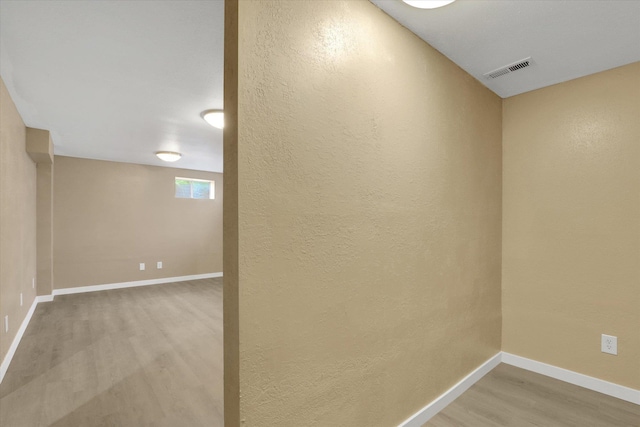 4319 S Myrtle St, Spokane, WA 99223 - spare room featuring light wood-style flooring and a textured wall