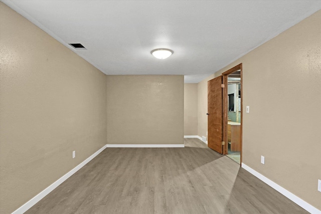 4319 S Myrtle St, Spokane, WA 99223 - spare room with wood finished floors and baseboards