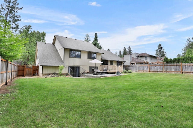 4319 S Myrtle St, Spokane, WA 99223 - rear view of property featuring a fenced backyard and roof with shingles