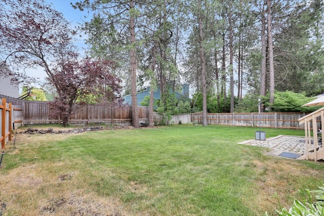 4319 S Myrtle St, Spokane, WA 99223 - fenced backyard with a patio