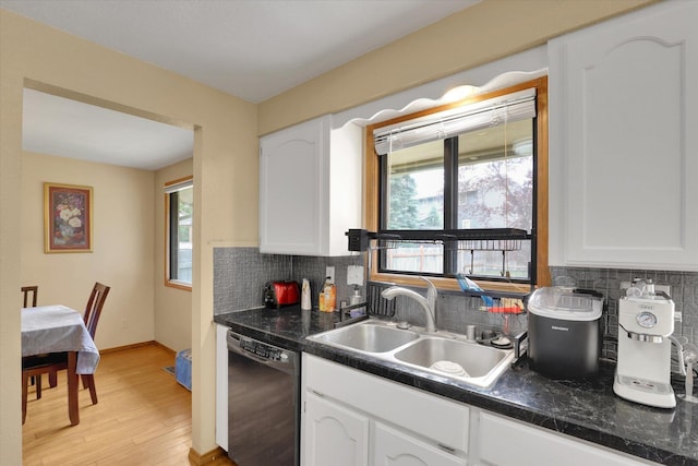 4319 S Myrtle St, Spokane, WA 99223 - kitchen featuring black dishwasher, white cabinets, dark countertops, and decorative backsplash