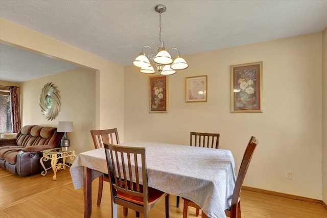 4319 S Myrtle St, Spokane, WA 99223 - dining space with light wood-style flooring and a chandelier