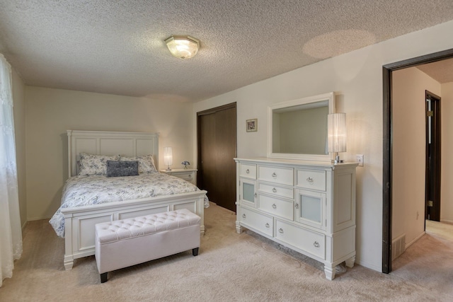 1026 W Bellwood Dr, Spokane, WA 99218 - bedroom featuring light carpet and a textured ceiling