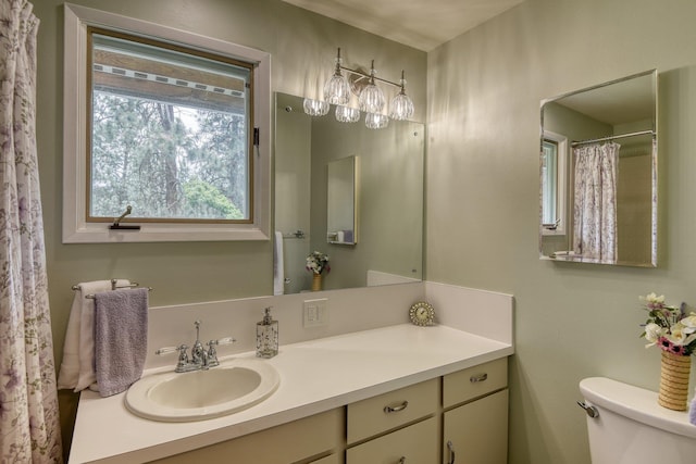 1026 W Bellwood Dr, Spokane, WA 99218 - bathroom with vanity and toilet