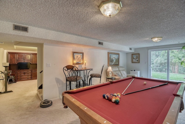 1026 W Bellwood Dr, Spokane, WA 99218 - game room featuring light colored carpet, a textured ceiling, and pool table