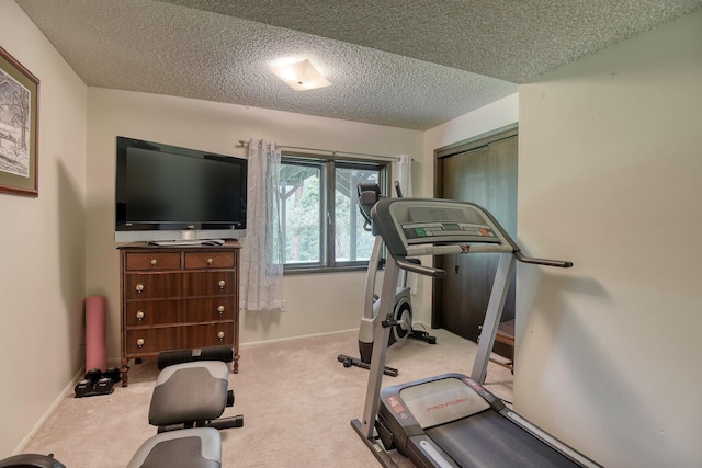 1026 W Bellwood Dr, Spokane, WA 99218 - workout room featuring carpet and a textured ceiling