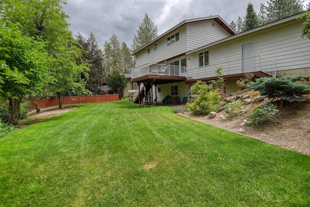 1026 W Bellwood Dr, Spokane, WA 99218 - rear view of property with stairs and a deck