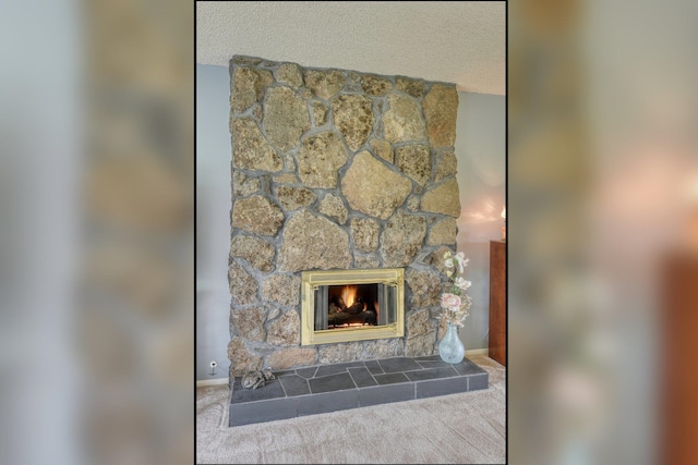 1026 W Bellwood Dr, Spokane, WA 99218 - detailed view of carpet and a stone fireplace