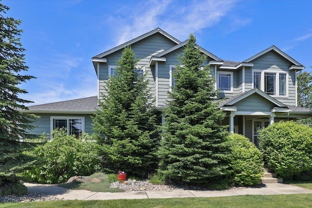 1716 W Country Hunt Ln, Spokane, WA 99224 - view of property hidden behind natural elements featuring roof with shingles