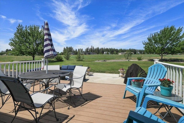 1716 W Country Hunt Ln, Spokane, WA 99224 - wooden deck featuring a yard and outdoor dining area
