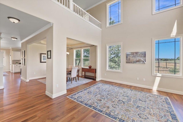 1716 W Country Hunt Ln, Spokane, WA 99224 - entrance foyer with crown molding and wood finished floors