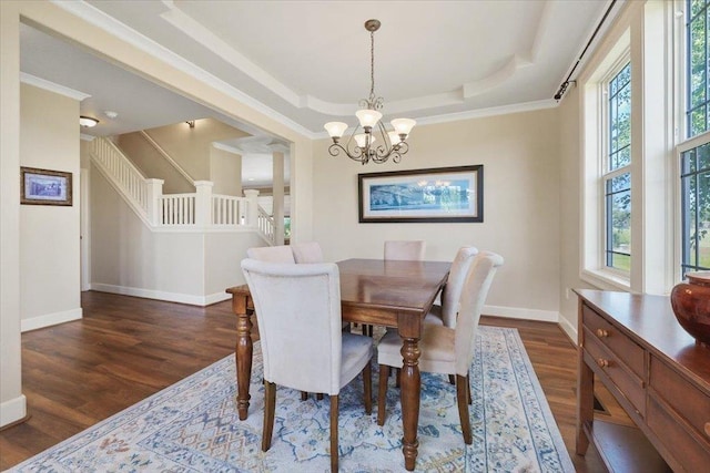 1716 W Country Hunt Ln, Spokane, WA 99224 - dining area featuring dark wood-style floors, a raised ceiling, a chandelier, stairway, and ornamental molding