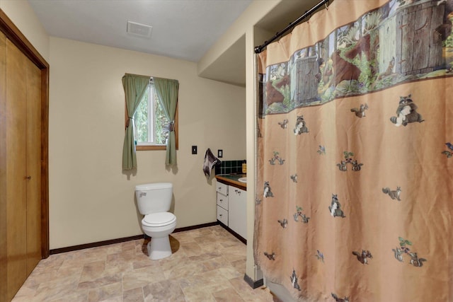 42503 N Regal Rd, Elk, WA 99009 - full bath featuring vanity, stone finish flooring, and a shower with shower curtain