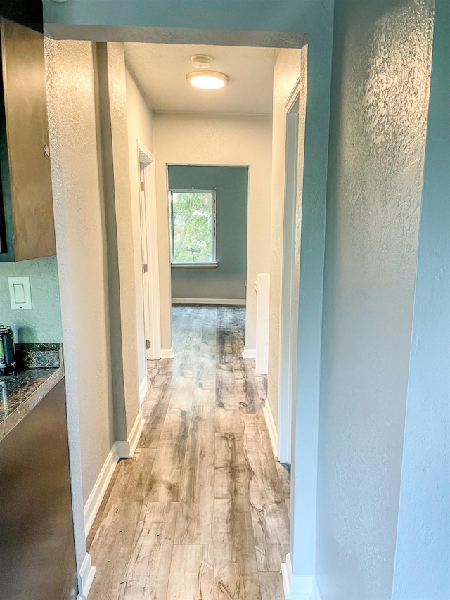 1616 N Cedar Ave, Spokane, WA 99205 - hall featuring light wood-style flooring and a textured wall