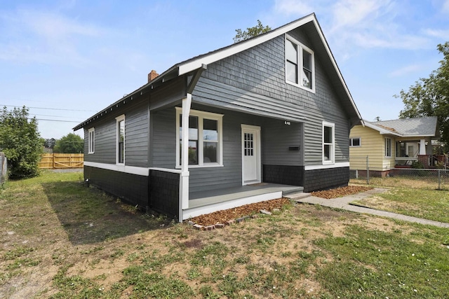 411 S Ferrall St, Spokane, WA 99202 - view of front of home featuring covered porch and a chimney