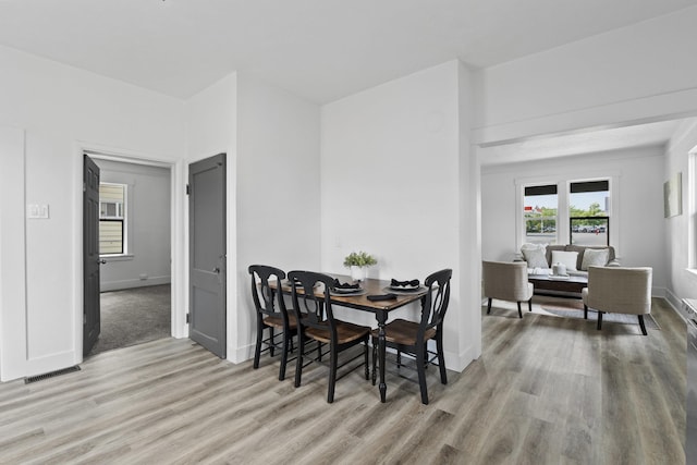 411 S Ferrall St, Spokane, WA 99202 - dining space featuring light wood-style floors and baseboards
