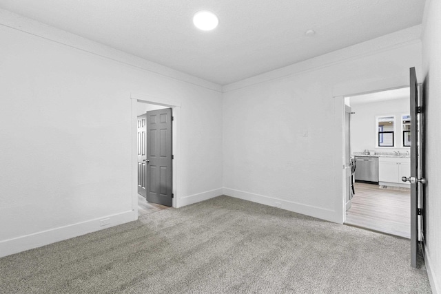 411 S Ferrall St, Spokane, WA 99202 - unfurnished room with light carpet and baseboards