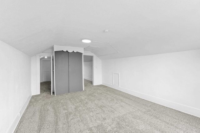 411 S Ferrall St, Spokane, WA 99202 - bonus room featuring carpet floors, vaulted ceiling, and attic access