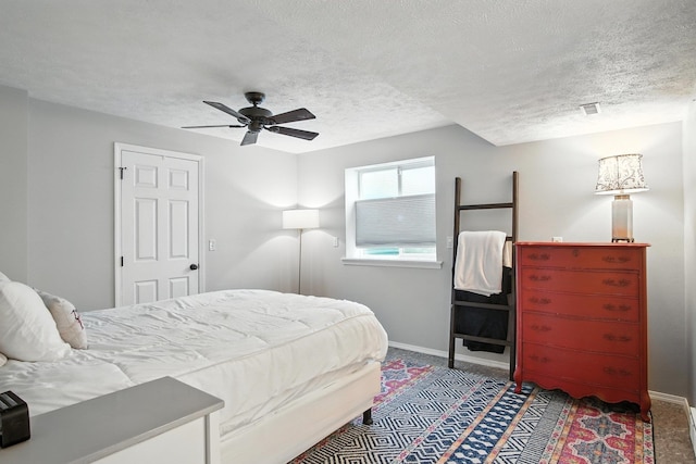 116 W Bristol Ave, Spokane, WA 99224 - bedroom featuring a textured ceiling, carpet floors, and a ceiling fan