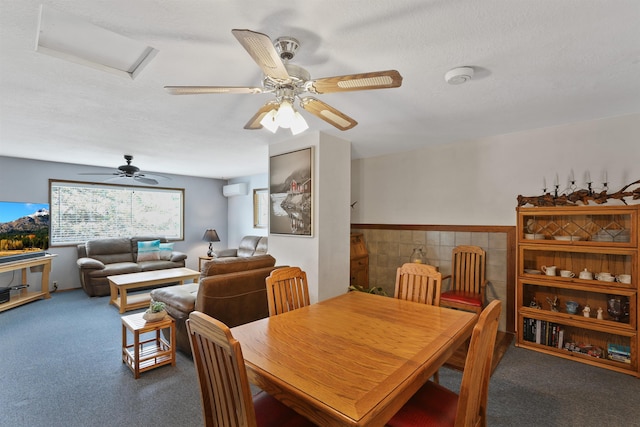 6519I Myrtle Dr, Nine Mile Falls, WA 99026 - dining area featuring carpet flooring, a ceiling fan, tile walls, and a wall mounted air conditioner
