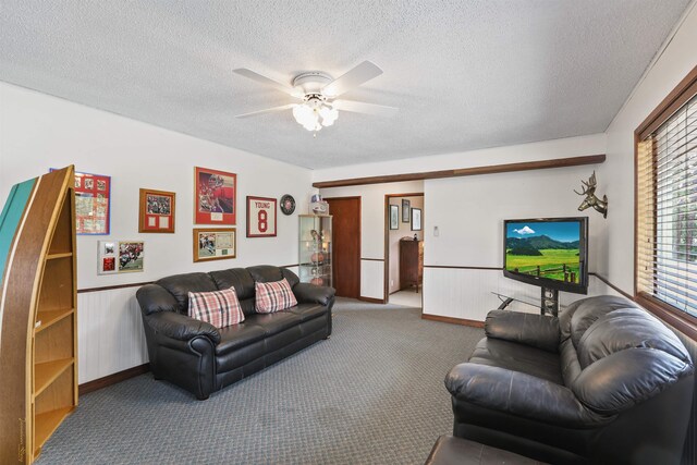 6519I Myrtle Dr, Nine Mile Falls, WA 99026 - carpeted living room with ceiling fan, a textured ceiling, and wainscoting